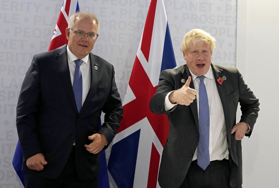 Prime Minister Boris Johnson (right) with Australia's Prime Minister Scott Morrison prior to a bilateral meeting during the G20 summit in Rome, Italy. Picture date: Saturday October 30, 2021.