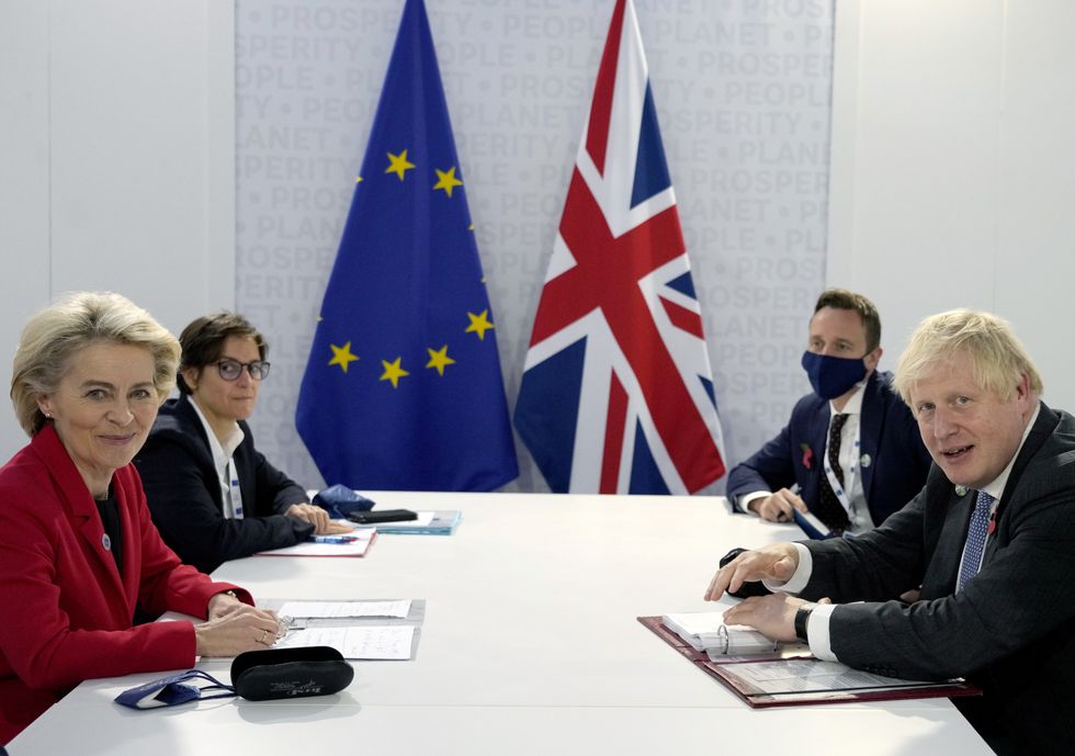 Prime Minister Boris Johnson (right) with European Commission President Ursula von der Leyen (left) prior to a bilateral meeting during the G20 summit in Rome, Italy. Picture date: Saturday October 30, 2021.