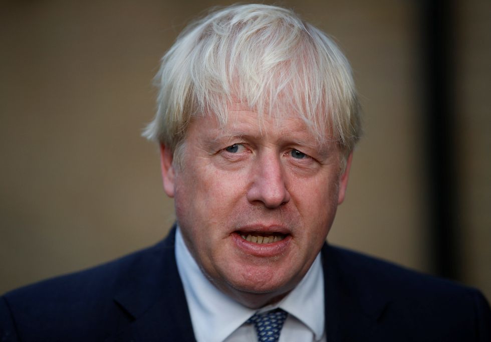 Prime Minister Boris Johnson speaks to the media at a police station in south east London, as he undertakes visits to meet police recruits and officers working in one of the 20 Violence Reduction Units. Picture date: Wednesday August 31, 2022.