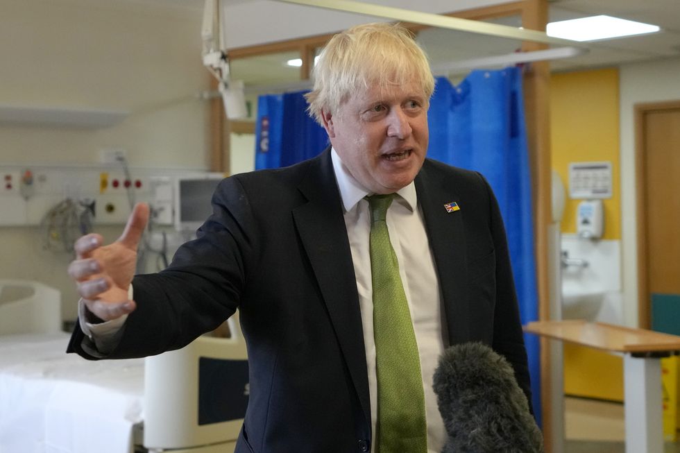 Prime Minister Boris Johnson speaks to the media during a visit to the South West London Elective Orthopaedic Centre in Epsom, Surrey, to see how their work is contributing towards busting the Covid backlogs by offering patients quicker access to treatment. Picture date: Friday August 26, 2022.