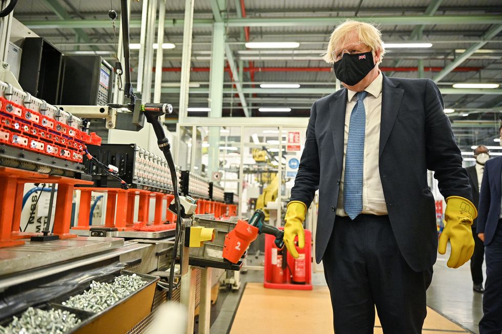 Prime Minister Boris Johnson visits the Envision AESC Holding Ltd battery manufacturing facility inside the Nissan plant in Sunderland