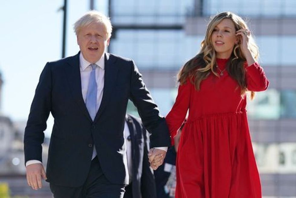 Prime Minister Boris Johnson with his wife Carrie. Boris Johnson's wife Carrie has given birth to her second child with the Prime Minister after a tumultuous 24 hours for Downing Street.