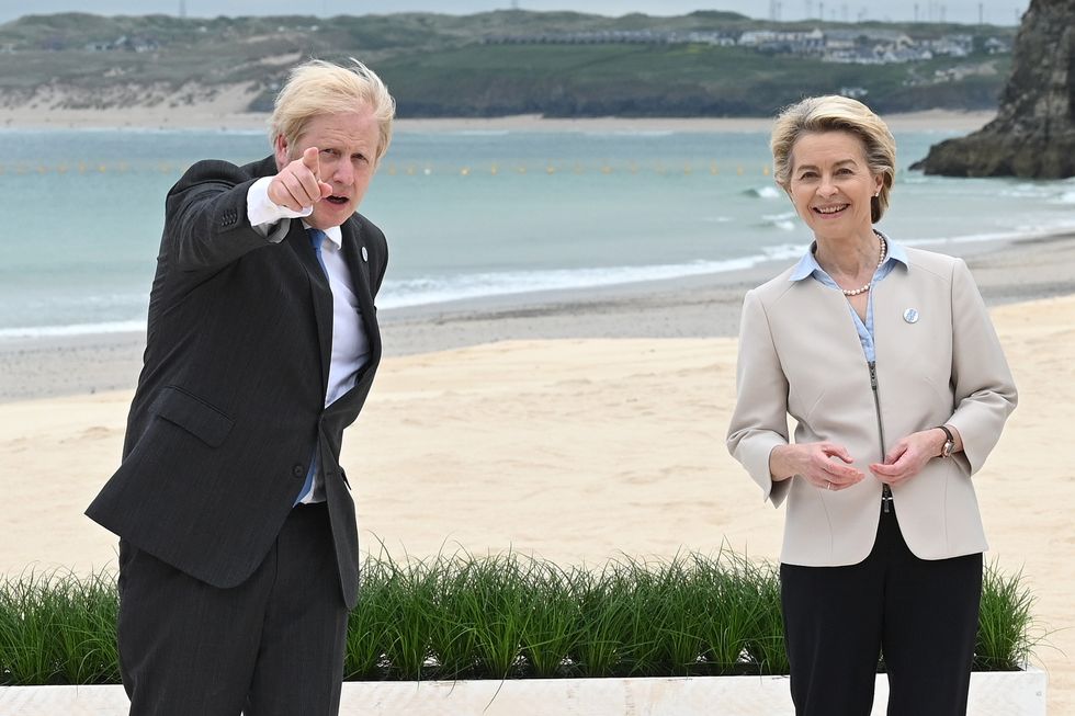 Prime Minister Boris Johnson with President of the European Commission Ursula von der Leyen during the Leaders official welcome and family photo, during the G7 summit in Cornwall. Picture date: Friday June 11, 2021.