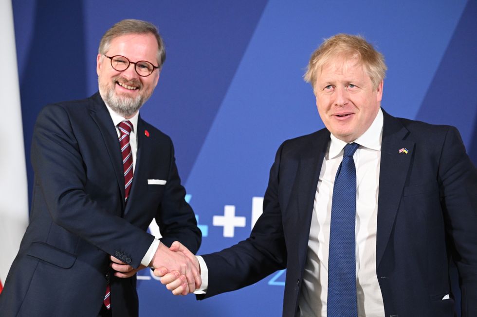 Prime Minister Boris Johnson with Prime Minister of the Czech Republic Petr Fiala as they meet for a bilateral meeting, as he hosts a meeting with the V4 leaders (Poland, Hungary, the Czech Republic and Slovakia) to discuss Ukraine crisis, at Lancaster House, London. Picture date: Tuesday March 8, 2022.