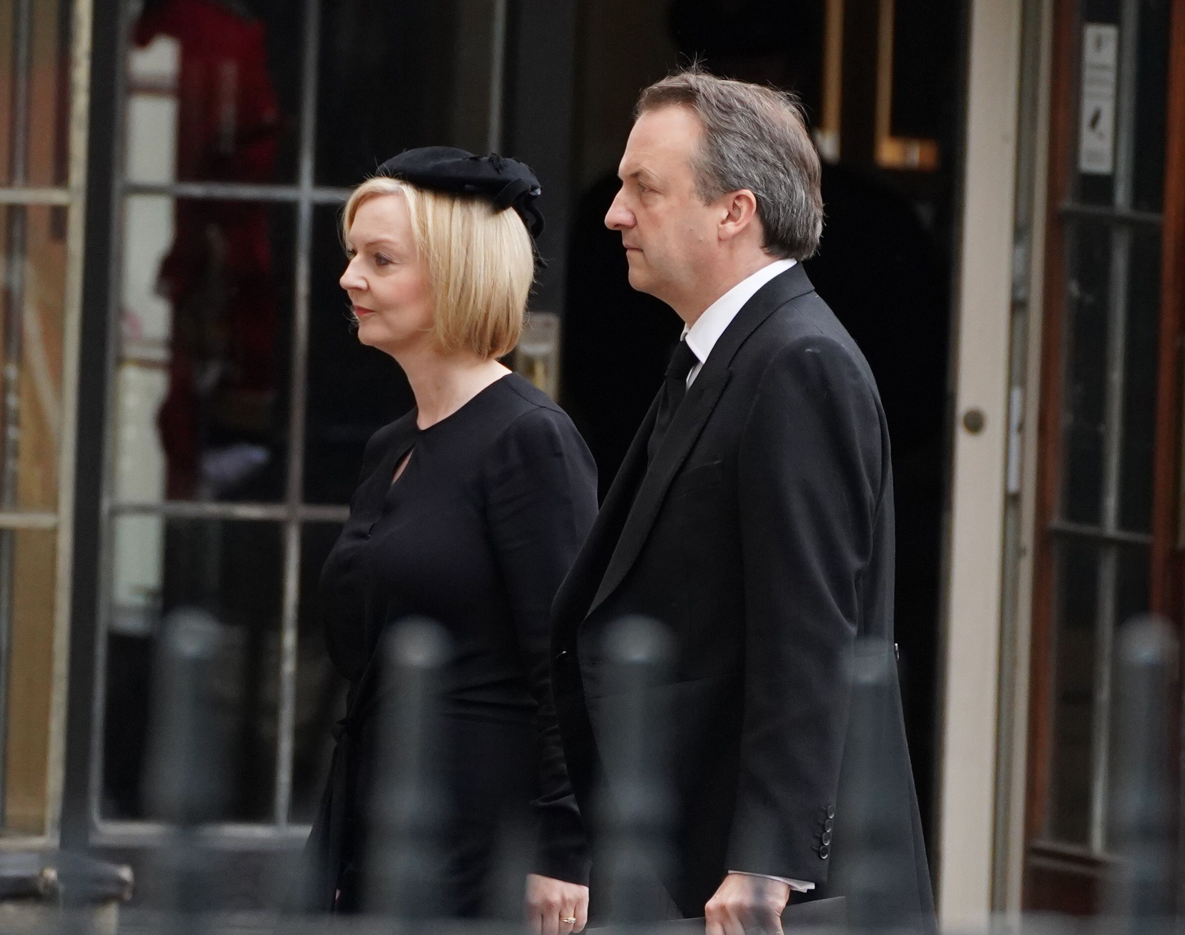 Prime Minister Liz Truss and husband Hugh O'Leary arrive at the State Funeral of Queen Elizabeth II, held at Westminster Abbey, London.Picture date: Monday September 19, 2022.
