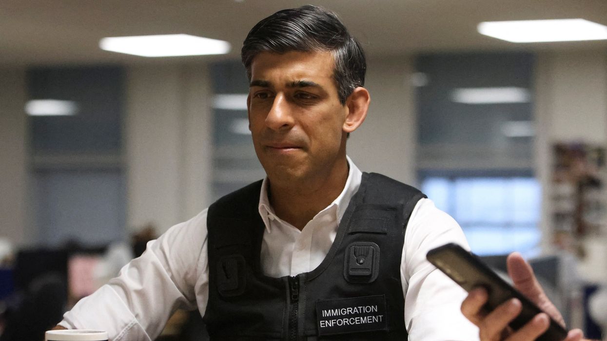 Prime Minister Rishi Sunak during a visit to an immigration office in north west London