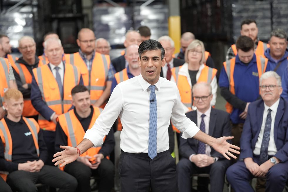 Prime Minister Rishi Sunak takes part in a Q&A with workers during a visit to West William Distribution in Ilkeston, Derbyshire
