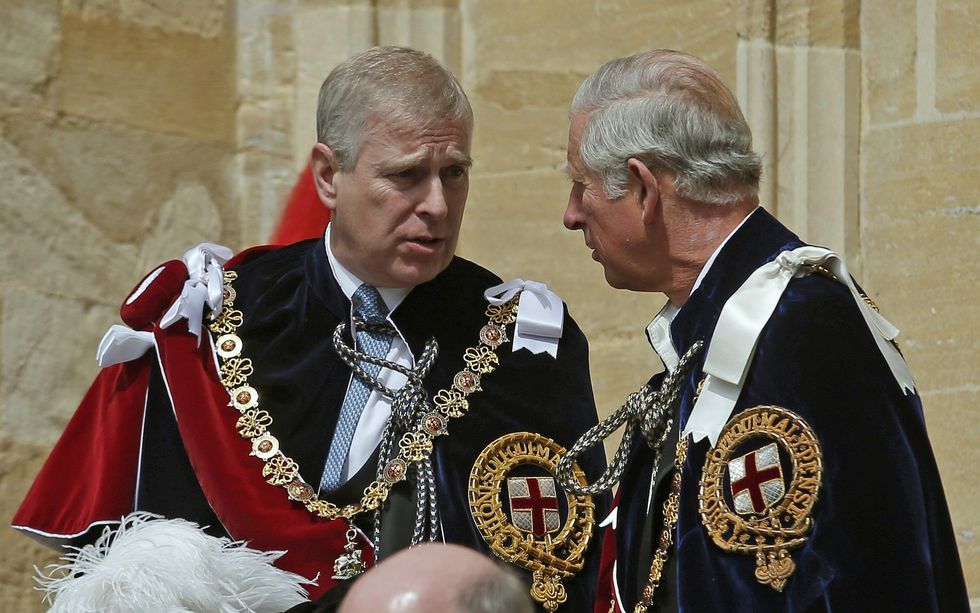 Prince Andrew and then-Prince Charles