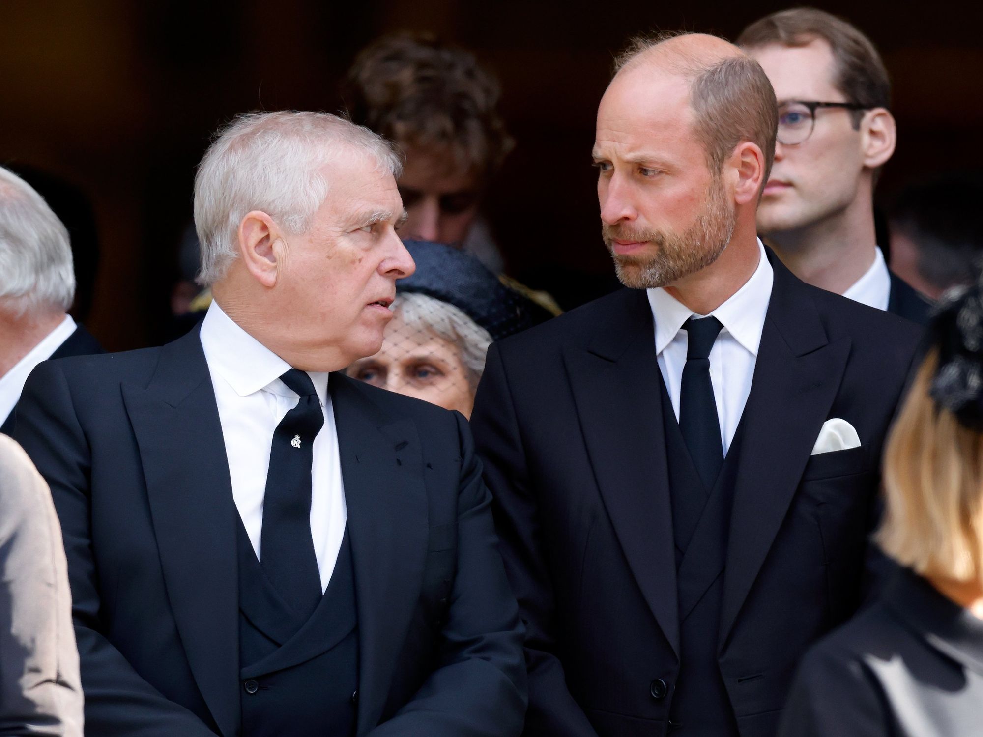 Prince Andrew attempts to speak to Prince William at the Duchess of Kent's funeral
