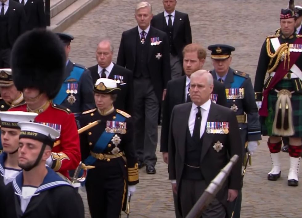 Prince Andrew fought back the tears as he marched behind Queen Elizabeth II's coffin