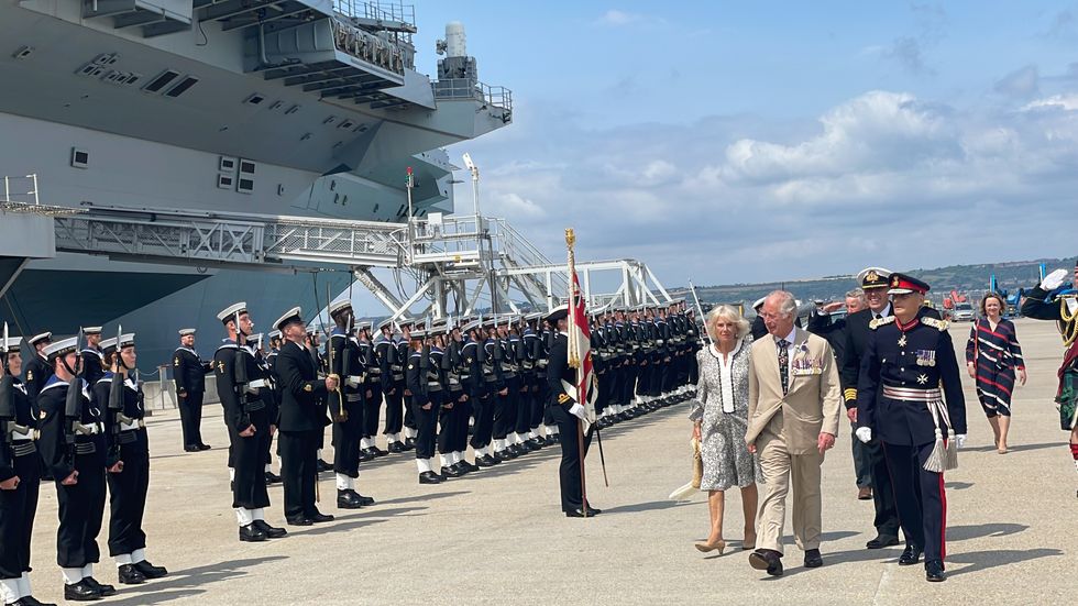 Prince Charles and Camilla during a visit to HMS Queen Elizabeth in Portsmouth