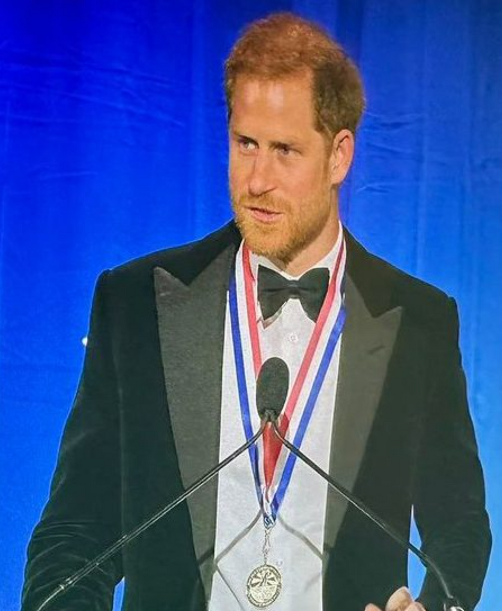Prince Harry accepting a Living Legend of Aviation award