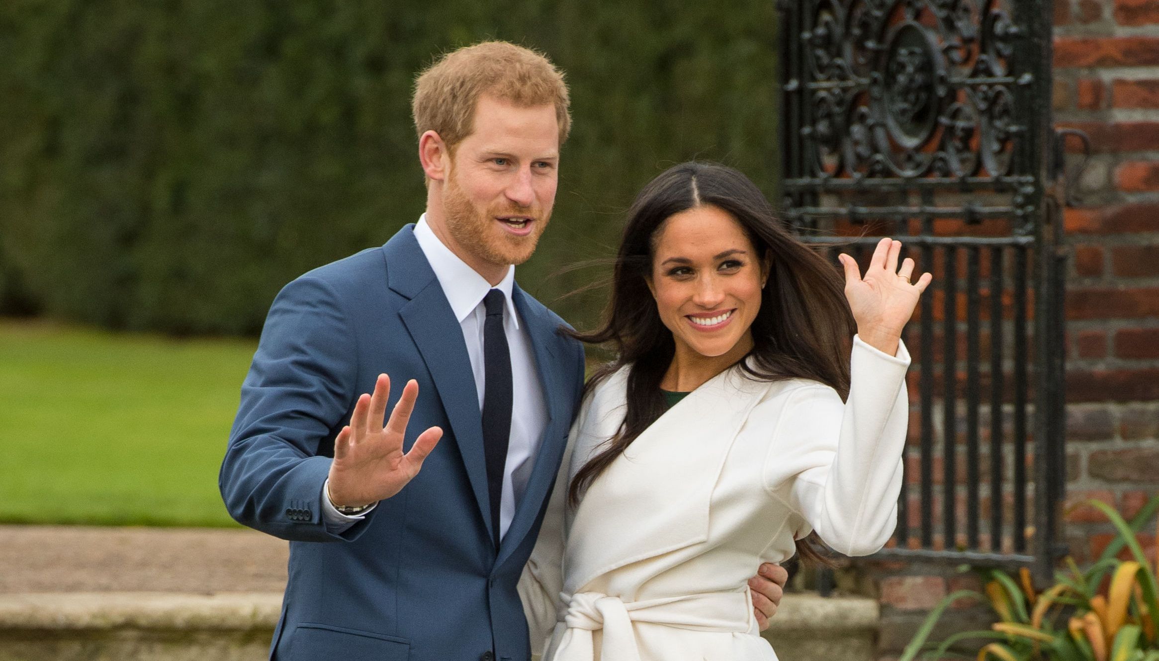Prince Harry and Meghan Markle in the Sunken Garden at Kensington Palace, London, after the announcement of their engagement.