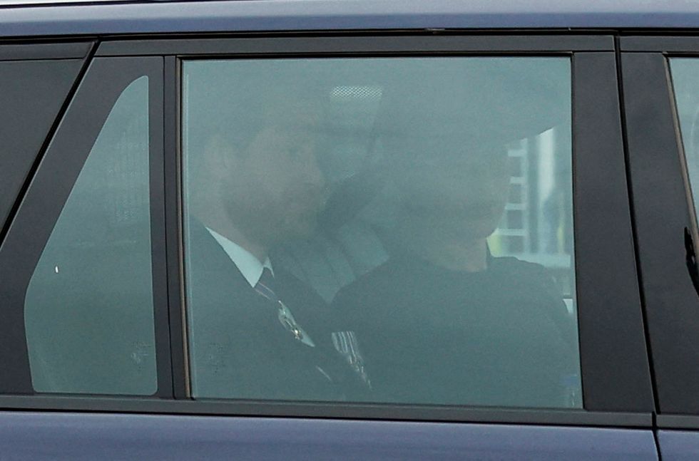 Prince Harry and Meghan Markle travelling to Westminster Abbey for Queen Elizabeth II's state funeral