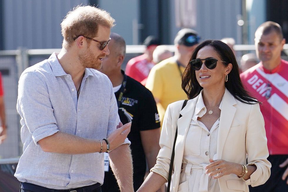 Meghan Markle wears Diana's Cartier watch as Prince William remains ...