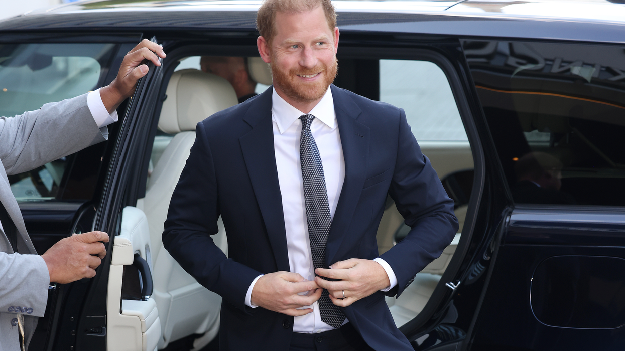 Prince Harry getting out of a car in London