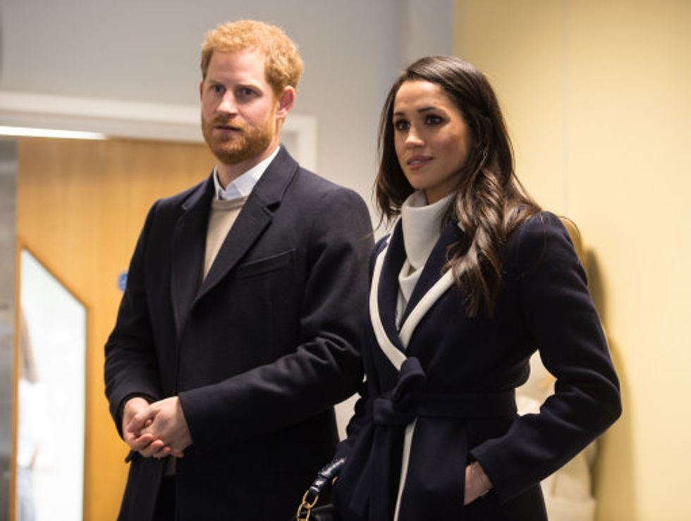 Prince Harry (left) and Meghan Markle join Birmingham's Coach Core apprentices at Nechells Wellbeing Centre as they take part in a training masterclass, during the latest leg in the regional tours the couple are undertaking in the run-up to their May wedding.
