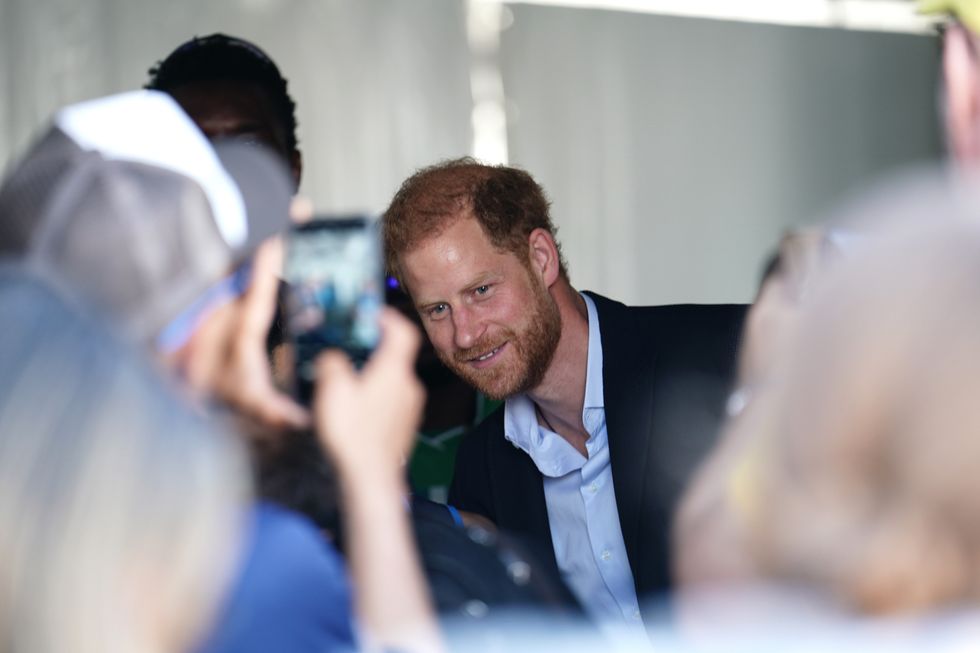 Prince Harry poses for photos at the Invictus Games