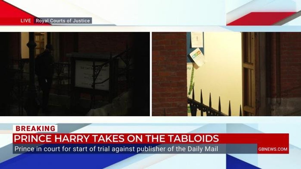 Prince Harry smiles and waves at media as he emerges after first day of High Court trial