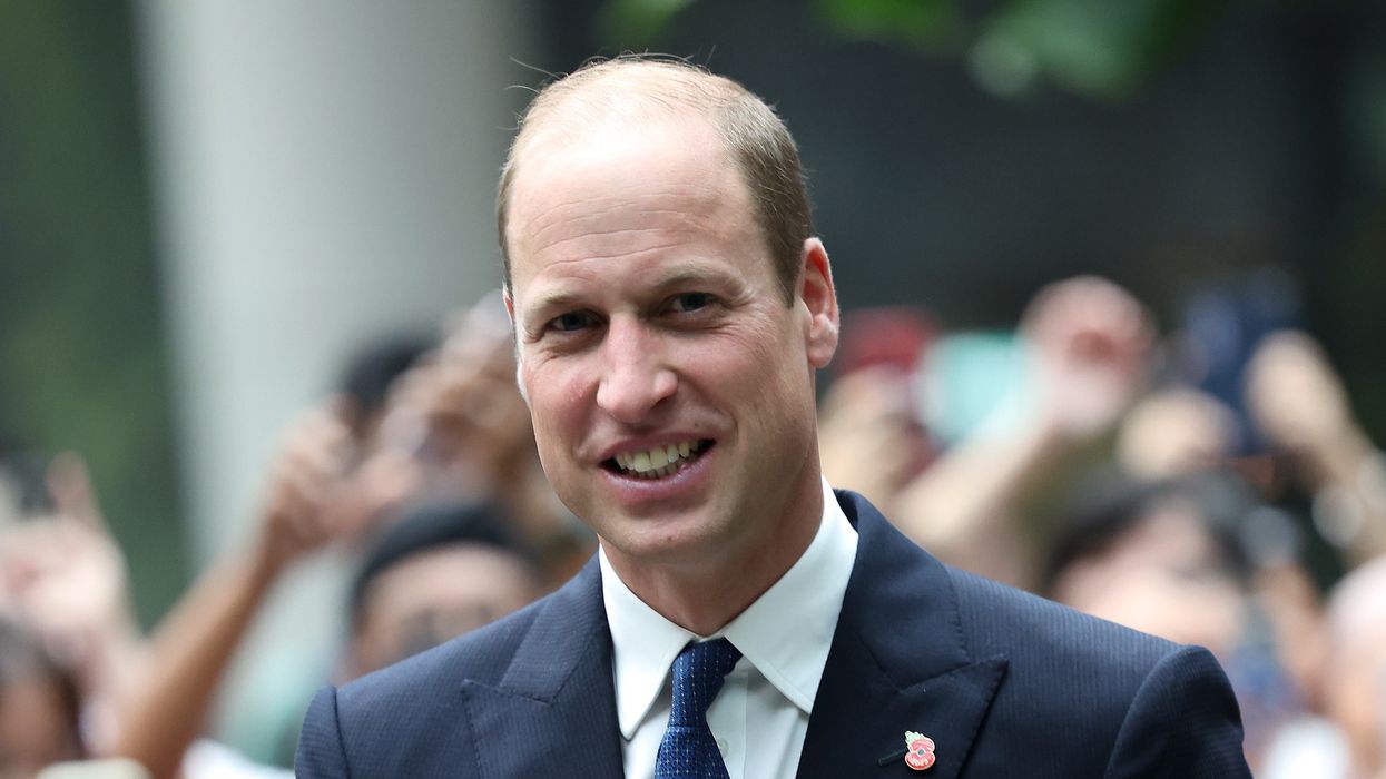 Prince of Wales greets members of the public during his visit to Jewel Changi Airport