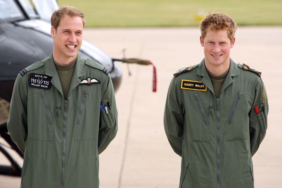 Prince William and Harry during a photocall at their military helicopter training course base at RAF Shawbury, Shrewsbury