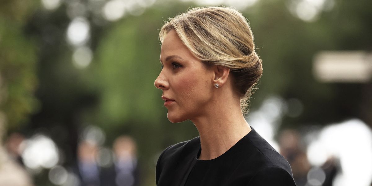 NextImg:Princess Charlene looks sombre and opts not to wear wedding ring as she attends funeral with Prince Albert