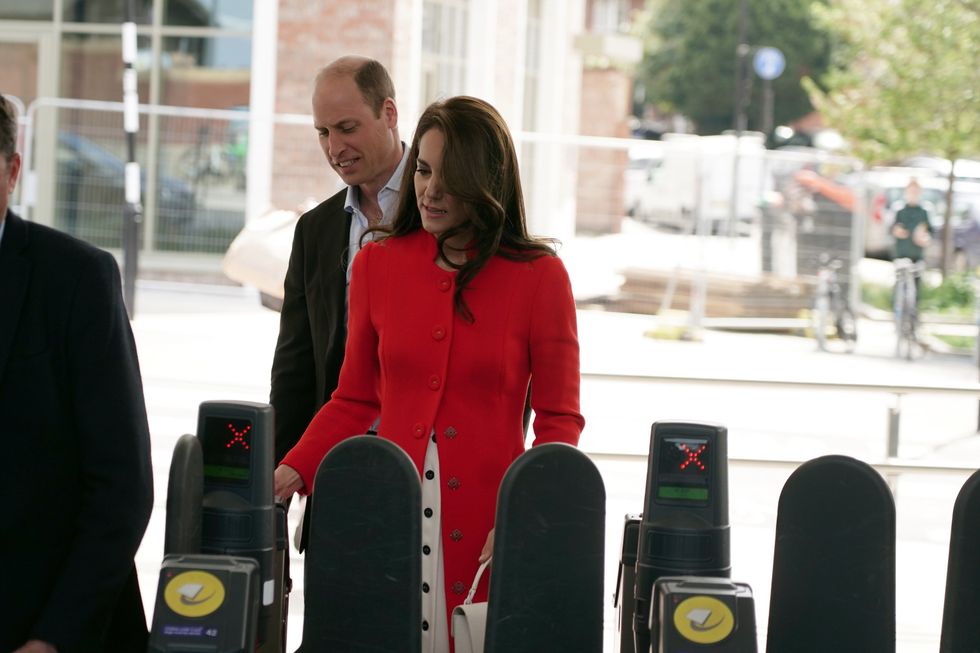 Prince William and Princess Catherine at a London Underground ticket barrier