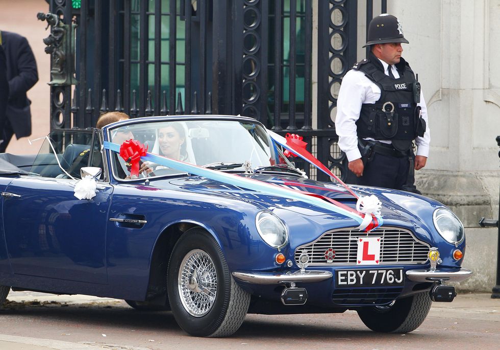Prince William and Princess Kate driving the Aston Martin DB6