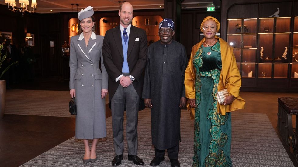 Prince William and Princess of Wales pictured meeting Nigerian President and First Lady