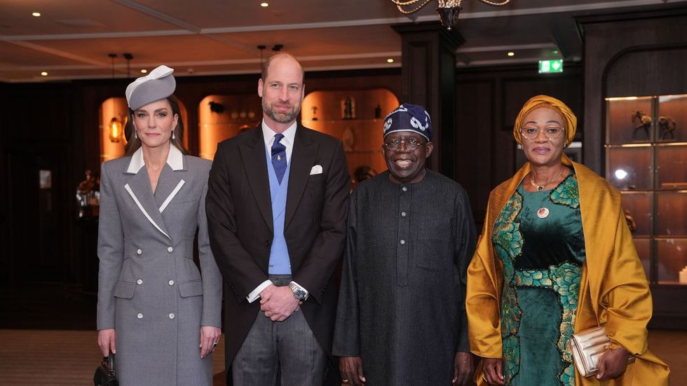 Prince William and Princess of Wales pictured meeting Nigerian President and First Lady