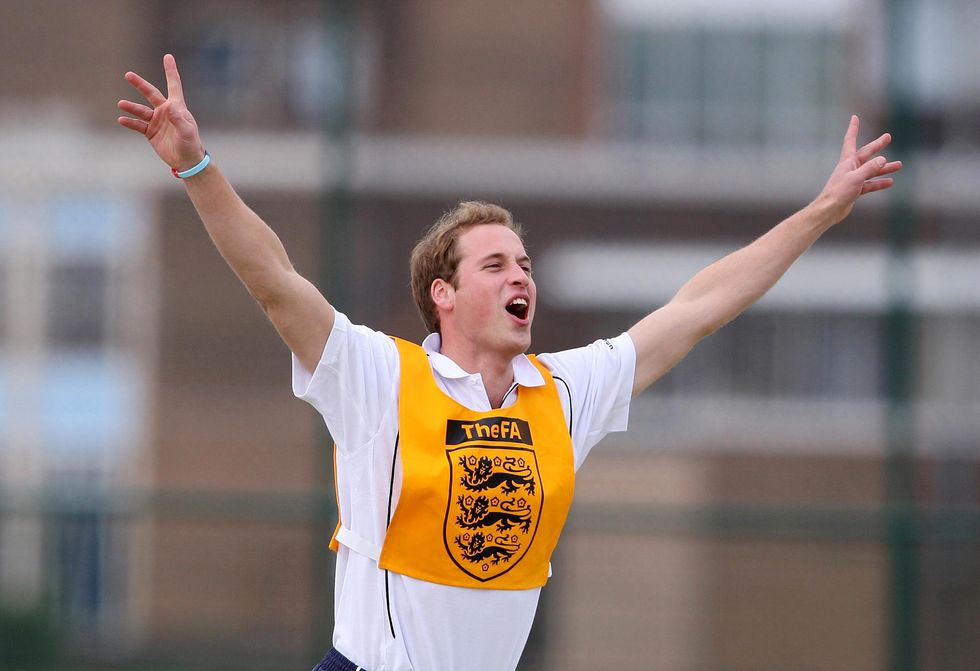 Prince William cheering as he plays football