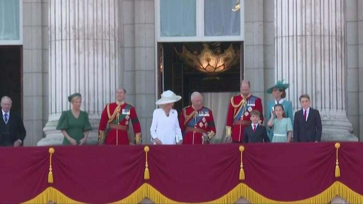 Prince William corrects Prince George's position on Buckingham Palace balcony