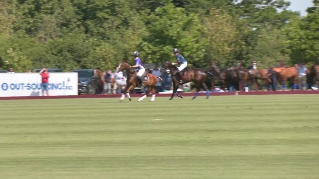 Prince William saddles up for charity polo match as Kate skips summer tradition