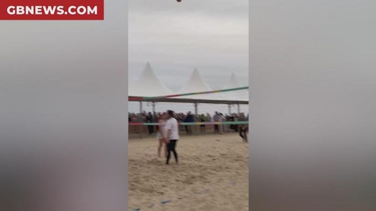 Crowd gasps after Prince William trips and falls while playing volleyball barefoot