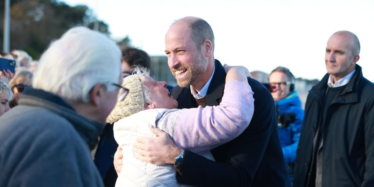 Prince William hugs member of the public during visit to North Wales Prince William hugs member of the public during visit to North Wales