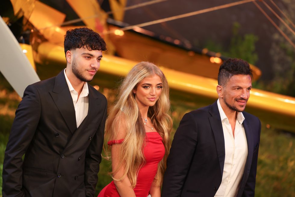 Princess Andre (middle) with her brother Junior (left) and dad Peter Andre (right)