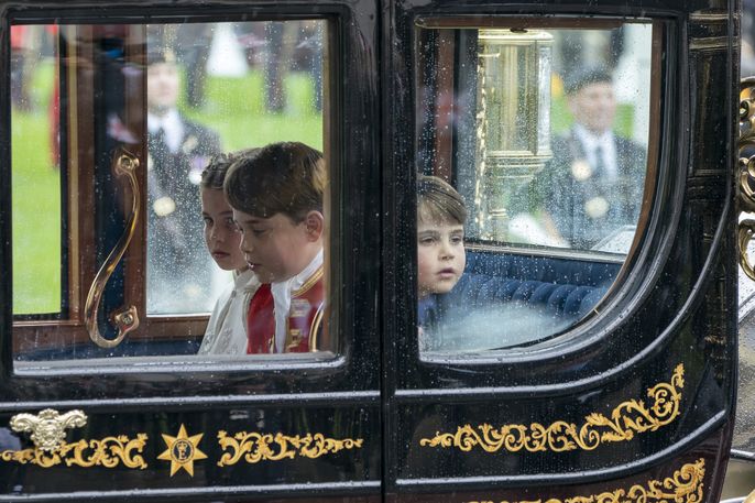 Princess Charlotte, Prince George and Prince Louis in a royal carriage