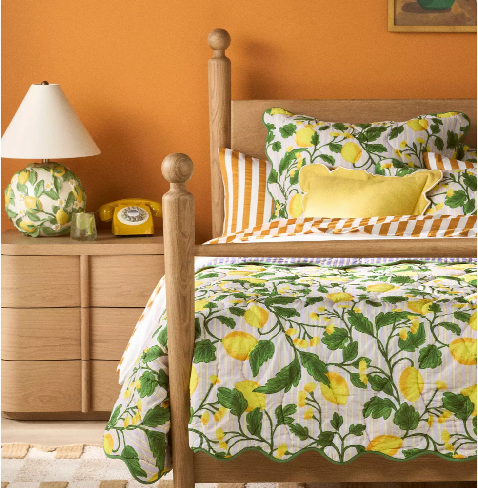 Printed quilt on bed