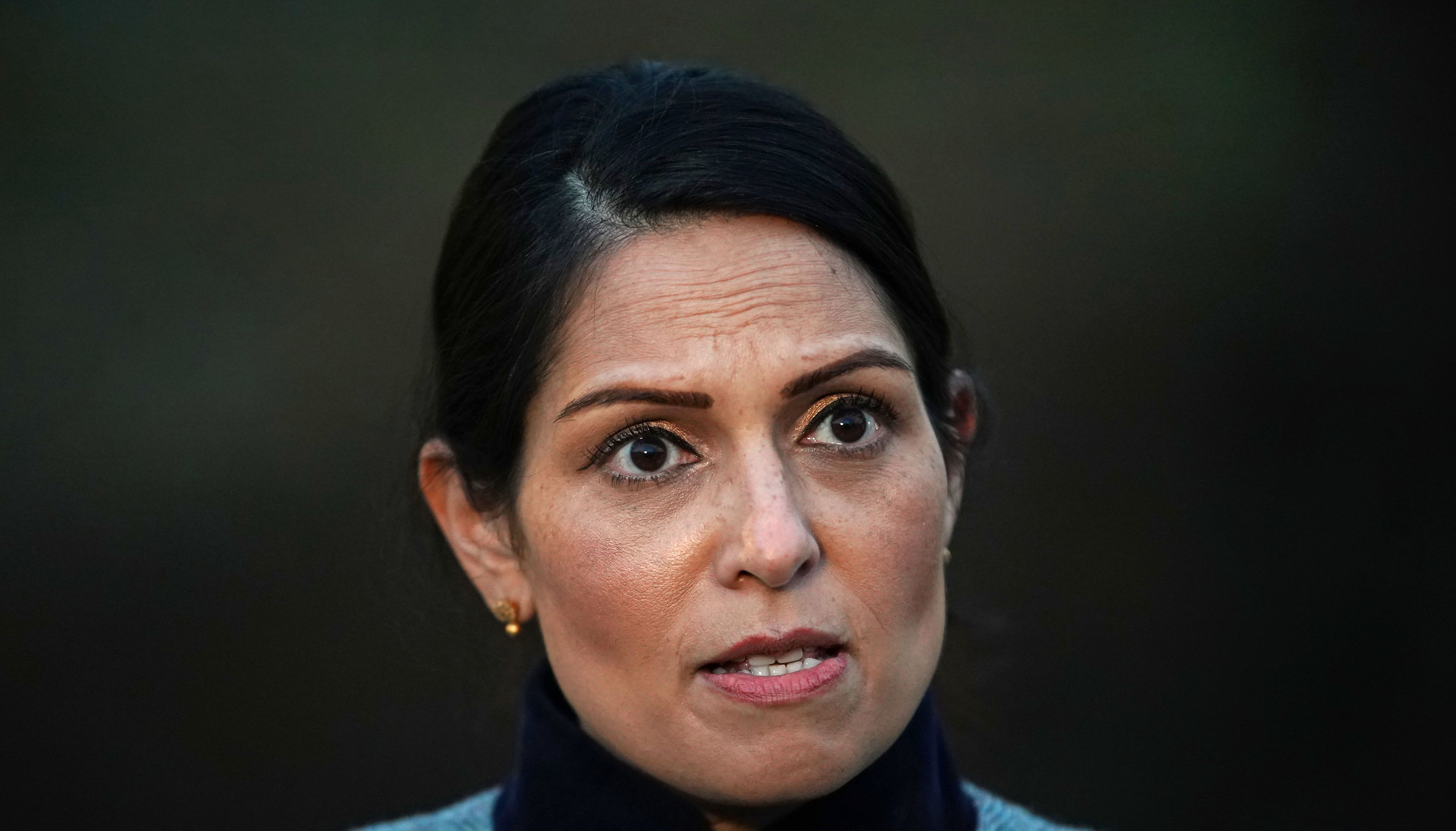 Priti Patel has been criticised by Tyrone Mings for her comments about taking the knee and 'gesture politics'.