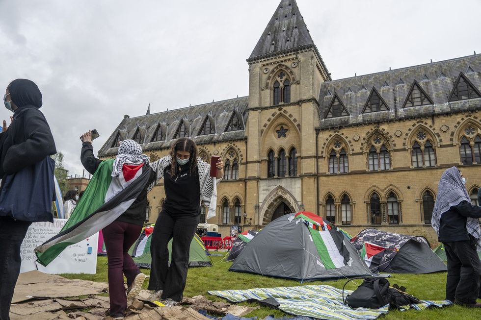 Pro-Palestine student activists take part in an encampment in front of the Oxford University Museum of Natural History