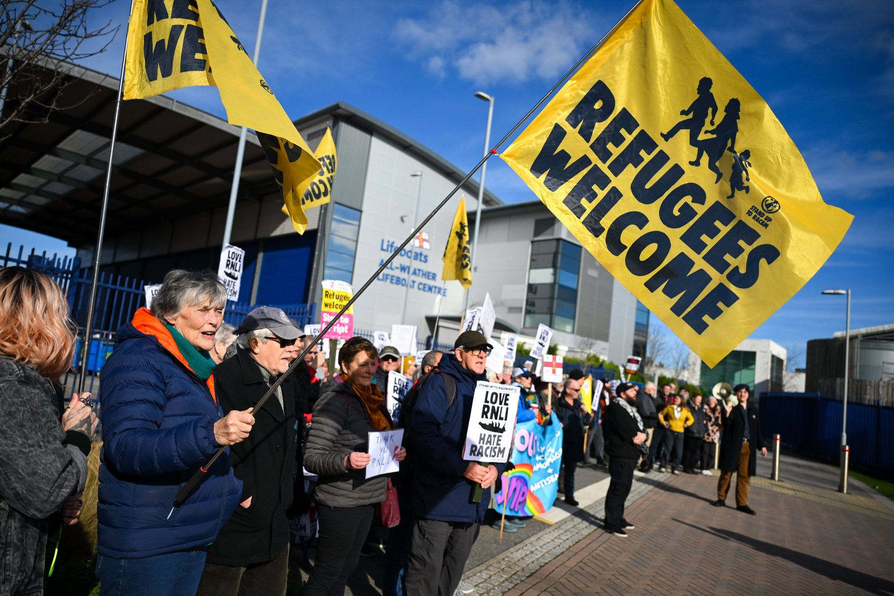 Pro-refugee protesters outside RNLI headquarters