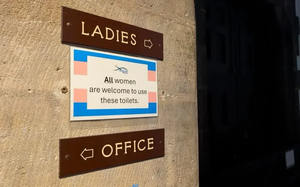 Pro-trans toilet sign