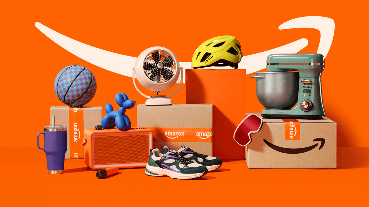 products stacked on an amazon box with the smile logo pictured in the background