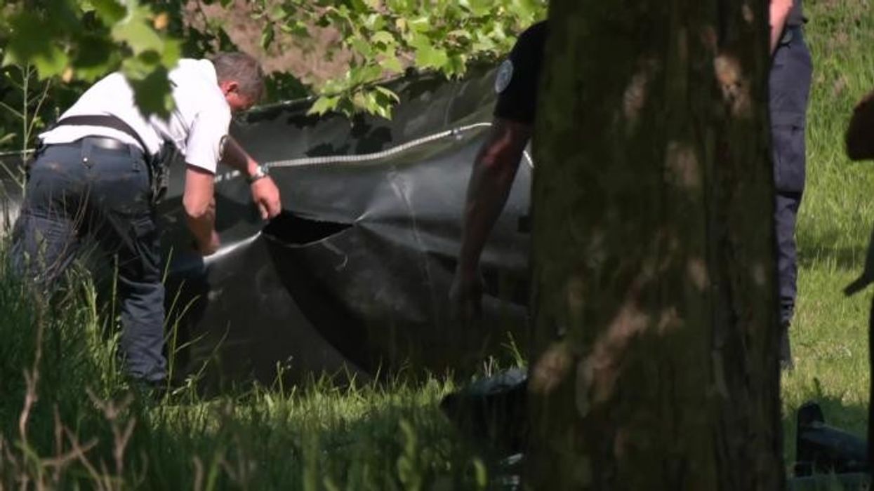 Proof French authorities actually do something with British money as Patrick Christys watches them slash migrant boat in Calais