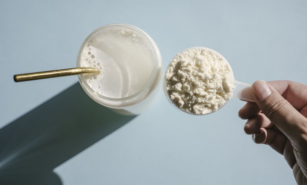 Protein shake and scoop with protein powder