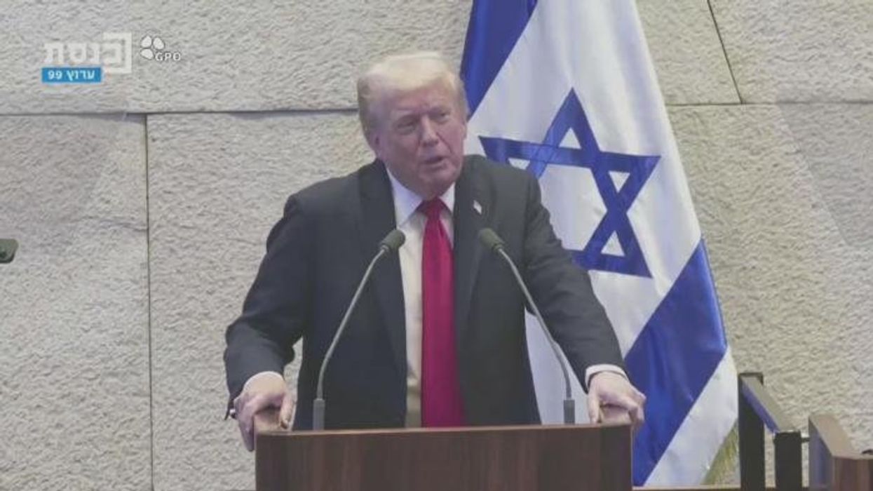 Protester heckles Donald Trump during speech to Israeli parliament as security forced to intervene