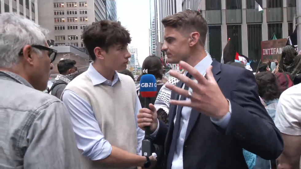 Protester speaking to Ben