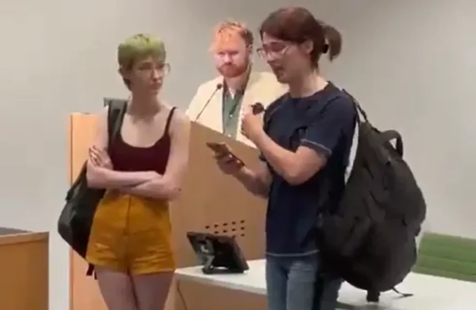 Protesters at oxford uni at a lecture