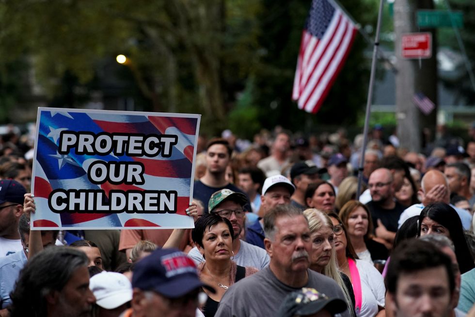 Protesters campaigning against new migrant centre