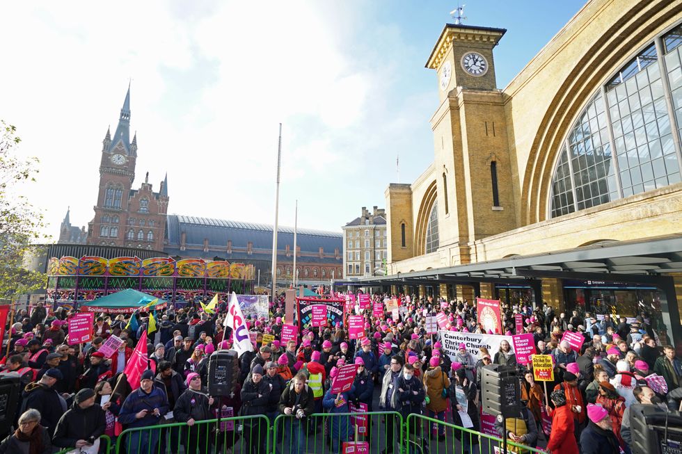 Protesters during a rally outside Kings Cross Station, London, as members of the University and College Union (UCU) take part 24-hour stoppage among university staff in an ongoing dispute over pay, pensions and conditions. Picture date: Wednesday November 30, 2022.